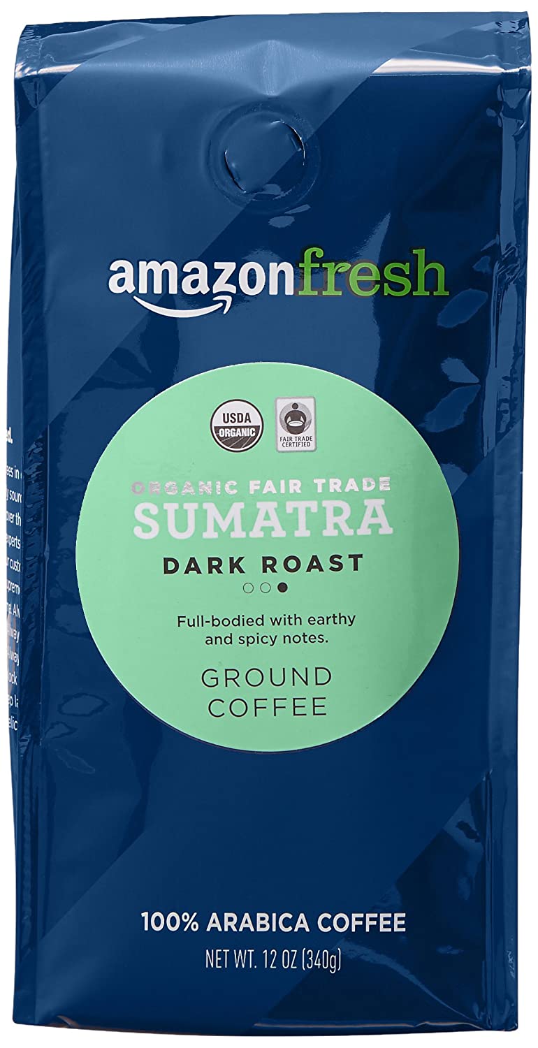 blue coffee bag with sumatra dark roast inside a green circle