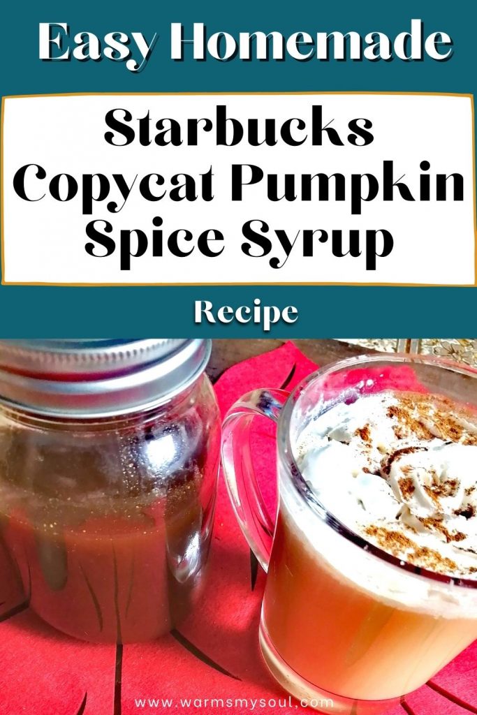 Dark blue background with the title "Easy Homemade Starbucks Copycat Pumpkin Spice Syrup Recipe" with a picture of Pumpkin spice syrup in a mason jar with a silver lid beside a pumpkin-spiced latte topped with whipped cream and a sprinkle of pumpkin spice. Both objects are on a large red maple leaf with a wooden surface beneath it.